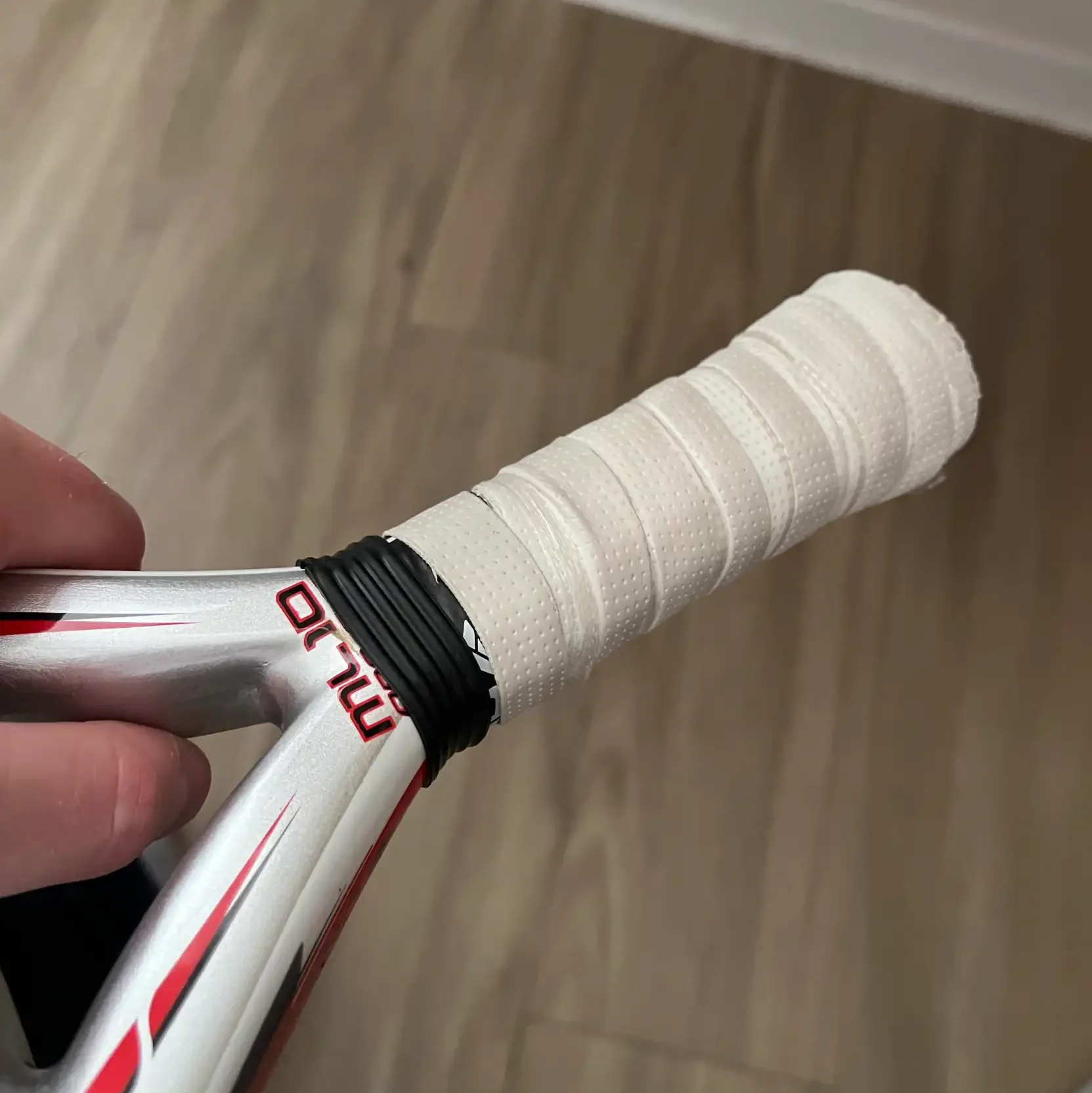 afbeelding van overgrip op mijn padel racket